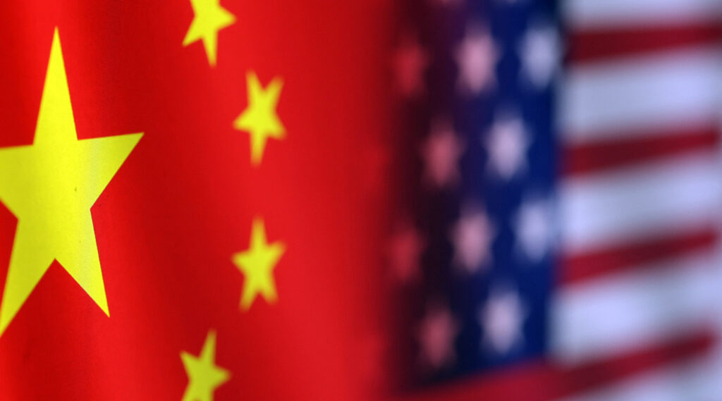 Flags of the United States and China | Credits: Reuters